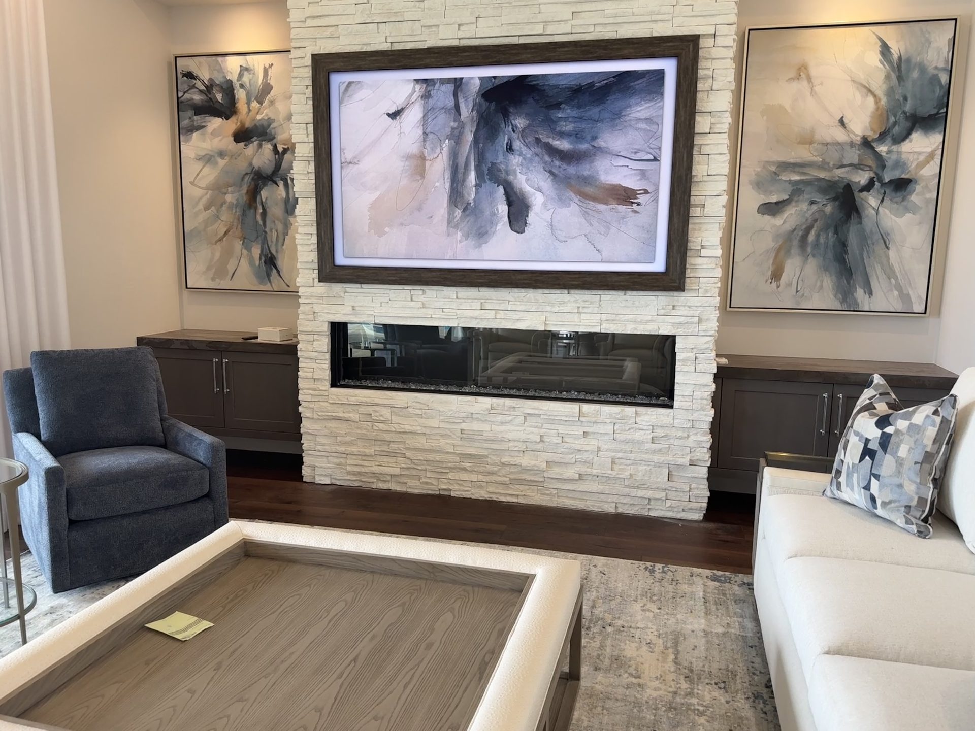 The Frame Pro in Art Mode matching the flanking paintings — Shadow Wood